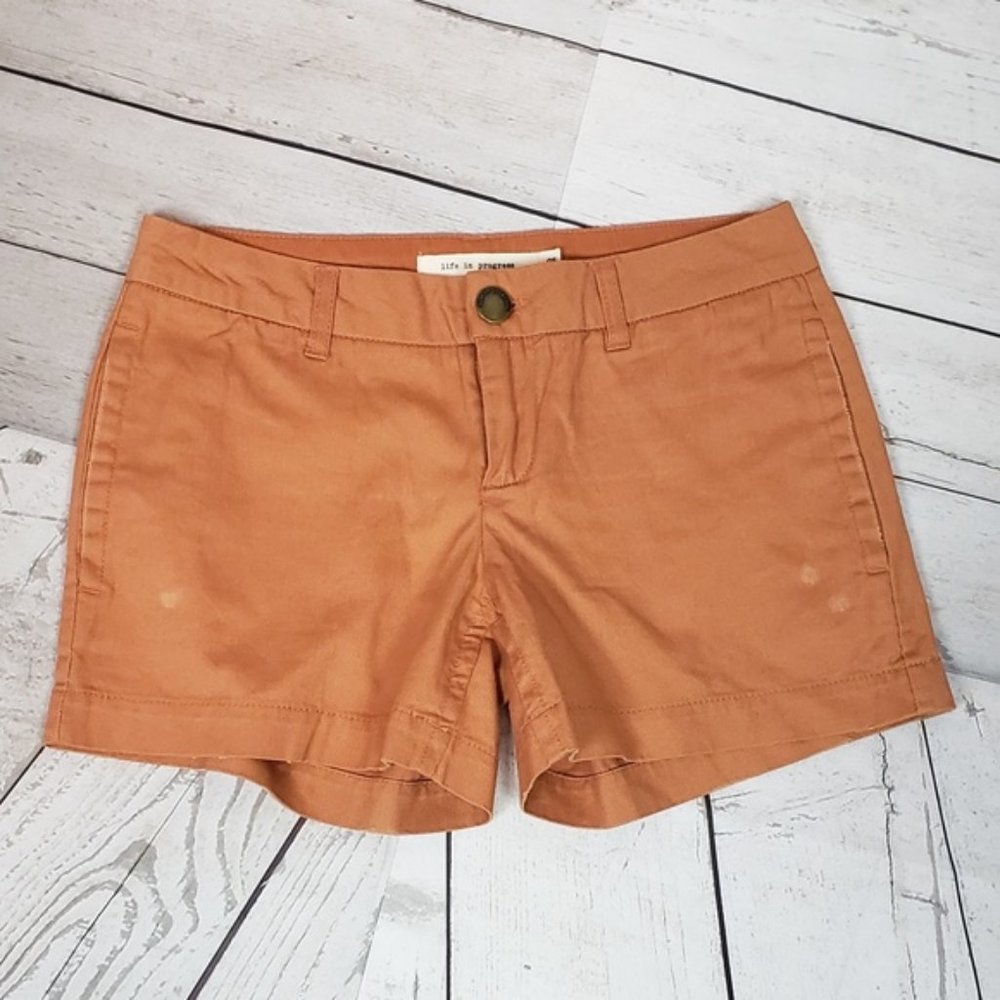 Life in Progress Orange Low Rise Distressed Shorts